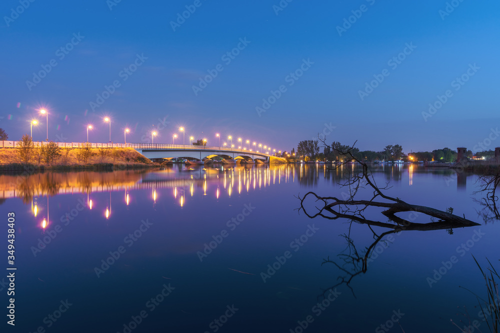 charming landscape on the river at sunset and night time charming landscape on the river at sunset and night time
