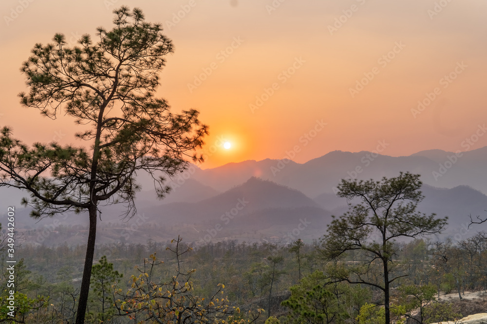 Northern Thailand During the Burning Season causes a beautiful sunset Northern Thailand During the Burning Season causes a beautiful sunset