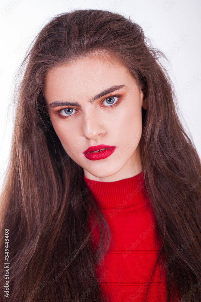 Portrait of a young beautiful woman in red dress Portrait of a young beautiful woman in red dress