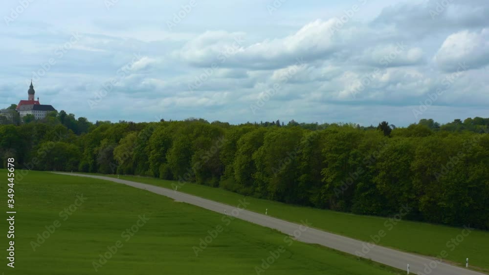 Aerial view of the city and monastery Andechs in Germany, Bavaria on a sunny spring day during the coronavirus lockdown. Aerial view of the city and monastery Andechs in Germany, Bavaria on a sunny spring day during the coronavirus lockdown.