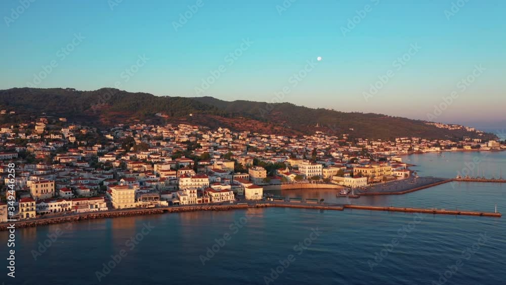 Greek island of Spetses in the Mediterranean Sea at sunrise. Greek island of Spetses in the Mediterranean Sea at sunrise.