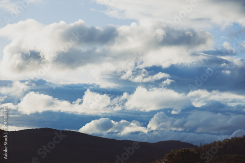 beautiful clouds over the mountains in Tasmania shot near Kunanyi