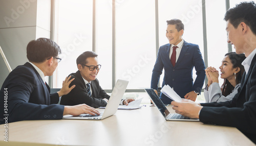 Wallpaper Mural Asian business people team analyzing statistics financial. Team of businesspeople Meeting Conference Discussion Corporate Concept in office. Torontodigital.ca