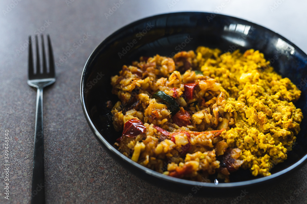plant-based food, vegan scrambled tofu with mediterranean veggies and potatoes plant-based food, vegan scrambled tofu with mediterranean veggies and potatoes
