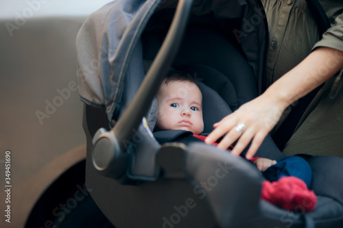 Cute Baby Waiting Patiently in Car Seat Going on Vacation