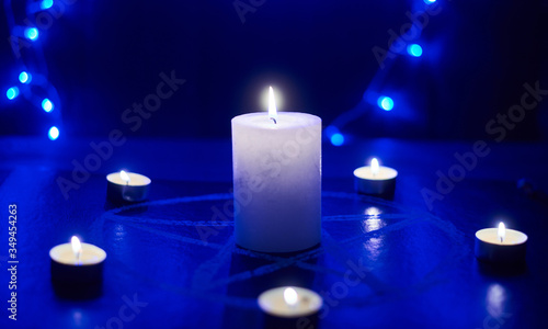 фотографія Pentagram and burning candles