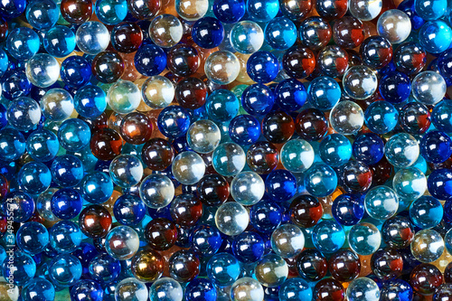A lot of multi-colored glass balls. Can be used as background.