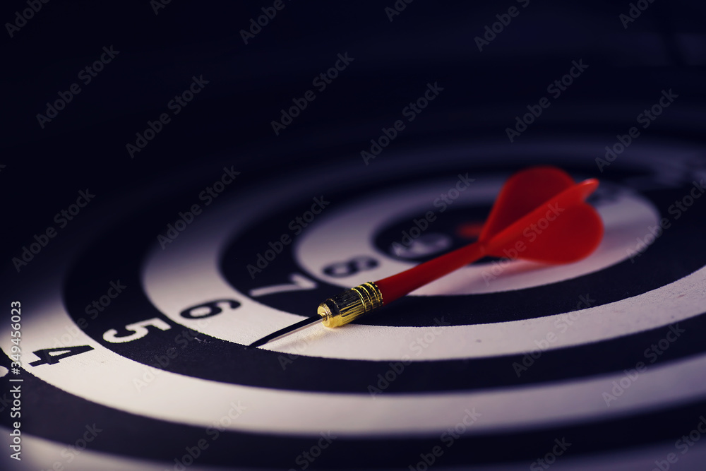 Fototapeta premium Darts. The dart for playing in the game board is stuck. Hit sector in darts. The concept of a successful strategy.