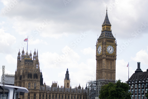 Photo of big ben clock tower and palace of westminster in London. Tourist attraction photo  cloudy and rainy weather