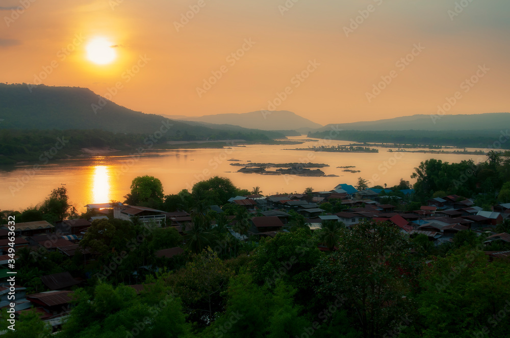 The beautiful nature, golden light, reflects the sunrise of Mun River, Ubon Ratchathani Province.