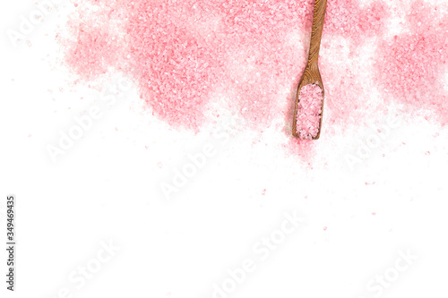 Pink salt isolated in scoop on white background. selective focus or blurry. photo