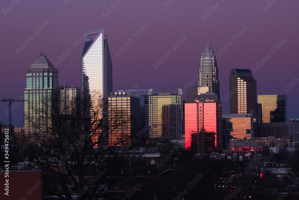 skyline of Charlotte North Carolina at sunset from the west side of the city 