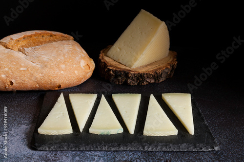 typical spanish manchego cheese and rustic bread