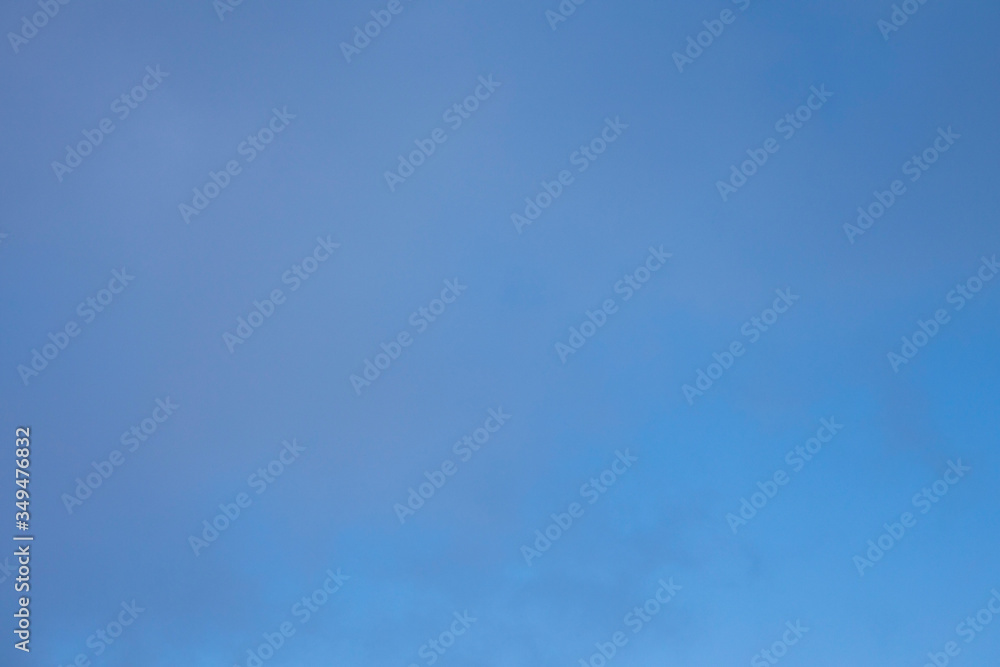 Obraz premium light beautiful clouds on blue sky. Soft background and texture