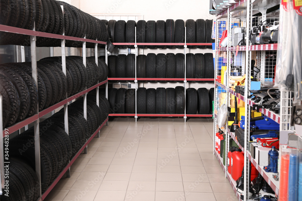 Tires and car care products in auto store Stock Photo | Adobe Stock