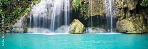 Beauty in nature  beautiful waterfall flowing of water with turquoise color of water in fresh rain forest or jungle of tropical climate. 