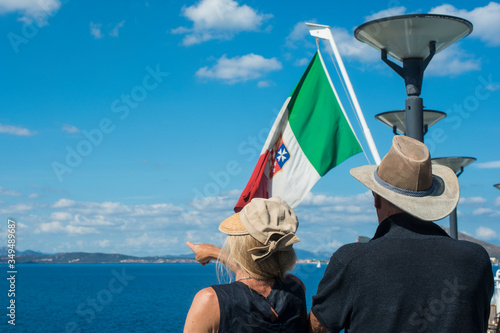 Fototapeta Naklejka Na Ścianę i Meble -  Turists looking at Golfo Aranci Olbia Sardinia