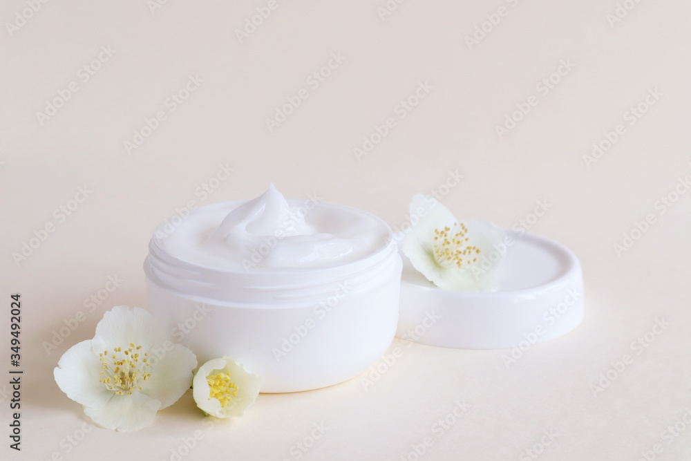 Cream moisturizer in the white jar. The concept of health and beauty. Cream moisturizer in the white jar. The concept of health and beauty.