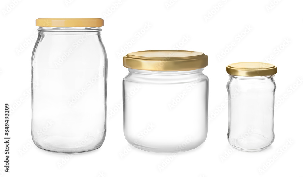 Set with closed empty glass jars on white background Set with closed empty glass jars on white background