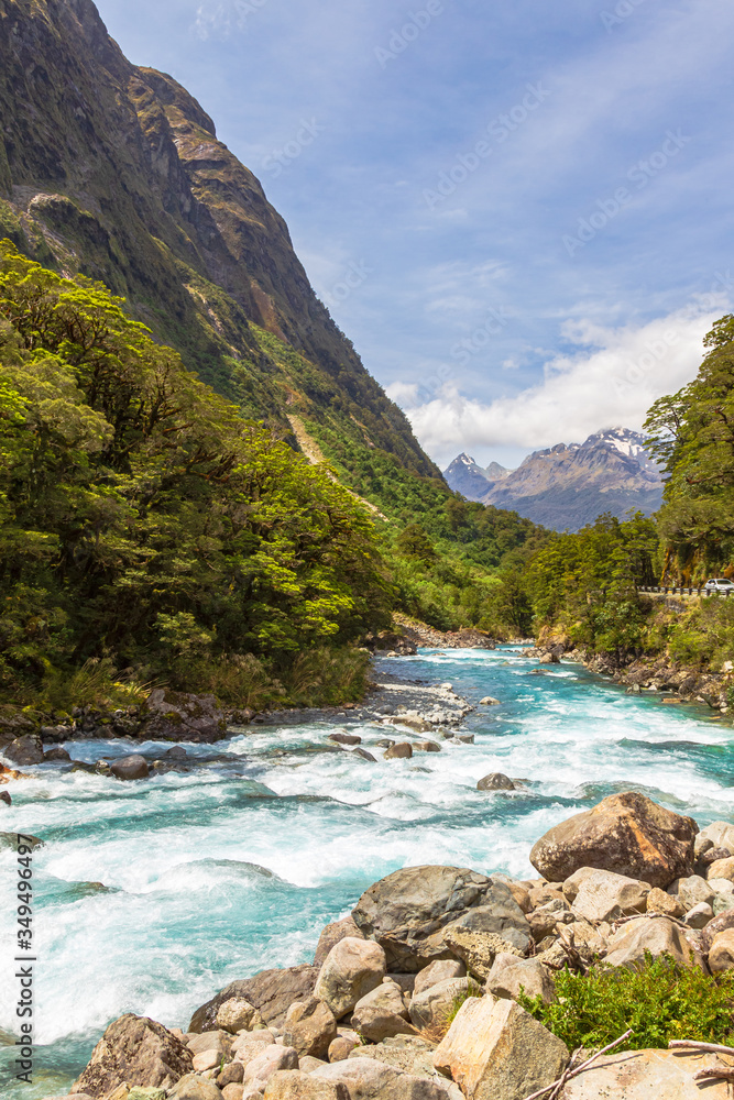Landscape with a fast river against the background of mountains. New Zealand
