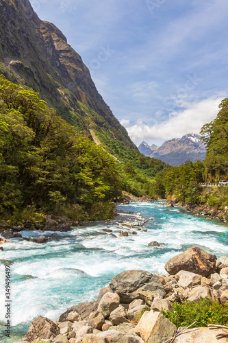 Landscape with a fast river against the background of mountains. New Zealand