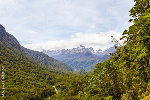 Landscapes of Fiordland National Park. A fast river among the dense forest below. South Island, New Zealand © Victor