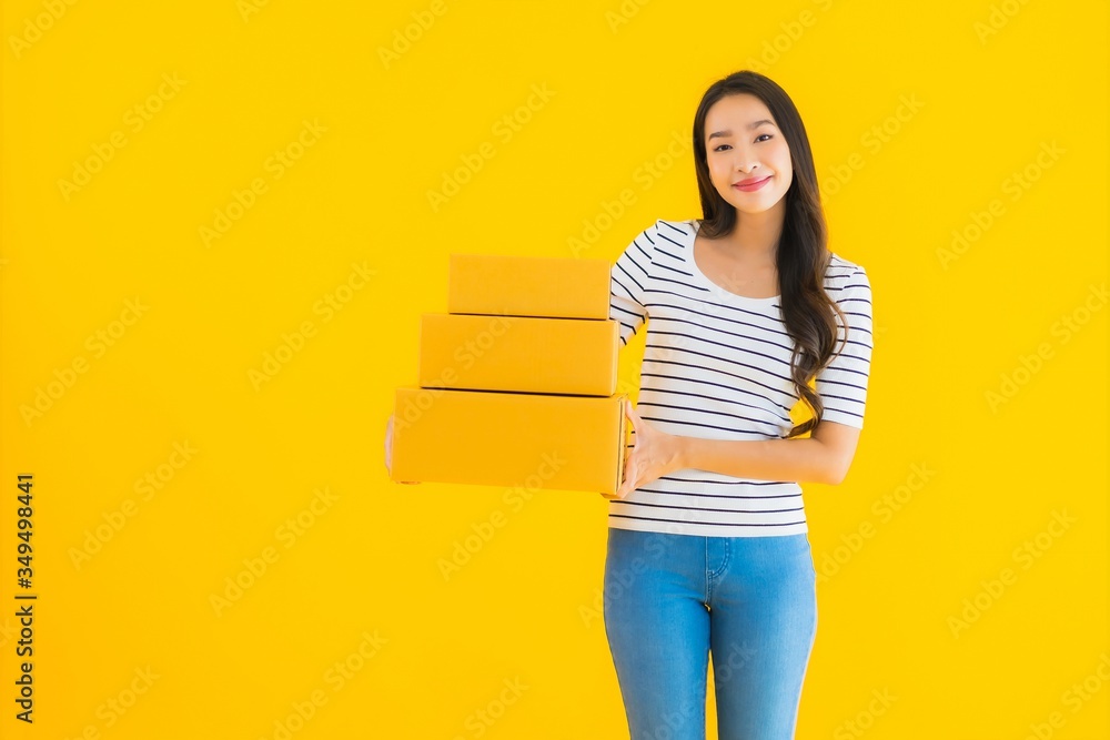 Portrait beautiful young asian woman with parcel box ready for shipping Portrait beautiful young asian woman with parcel box ready for shipping