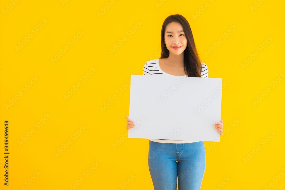 Portrait beautiful young asian woman show empty white billboard sign Portrait beautiful young asian woman show empty white billboard sign