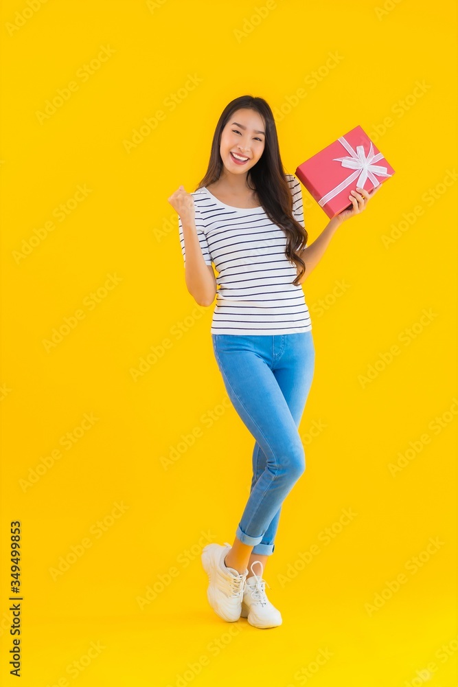 Portrait beautiful young asian woman show red gift box Portrait beautiful young asian woman show red gift box