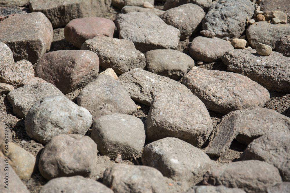 Pile of stones view. Preparing to fill the Foundation for the construction of a residential building or laying a garden path. Pile of stones view. Preparing to fill the Foundation for the construction of a residential building or laying a garden path.
