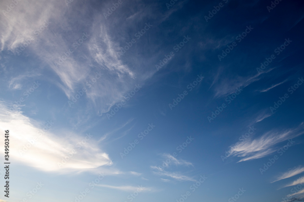 beautiful white Cumulus clouds on a blue. Background and texture of the sky beautiful white Cumulus clouds on a blue. Background and texture of the sky
