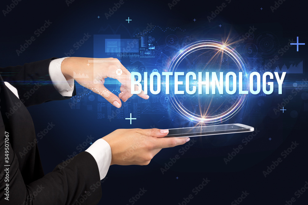 Close-up of a touchscreen with BIOTECHNOLOGY inscription, new technology concept Close-up of a touchscreen with BIOTECHNOLOGY inscription, new technology concept