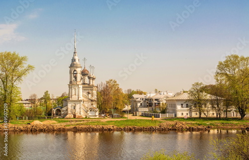 Ancient Sretensky temple on river bank in ancient Russian city of Vologda