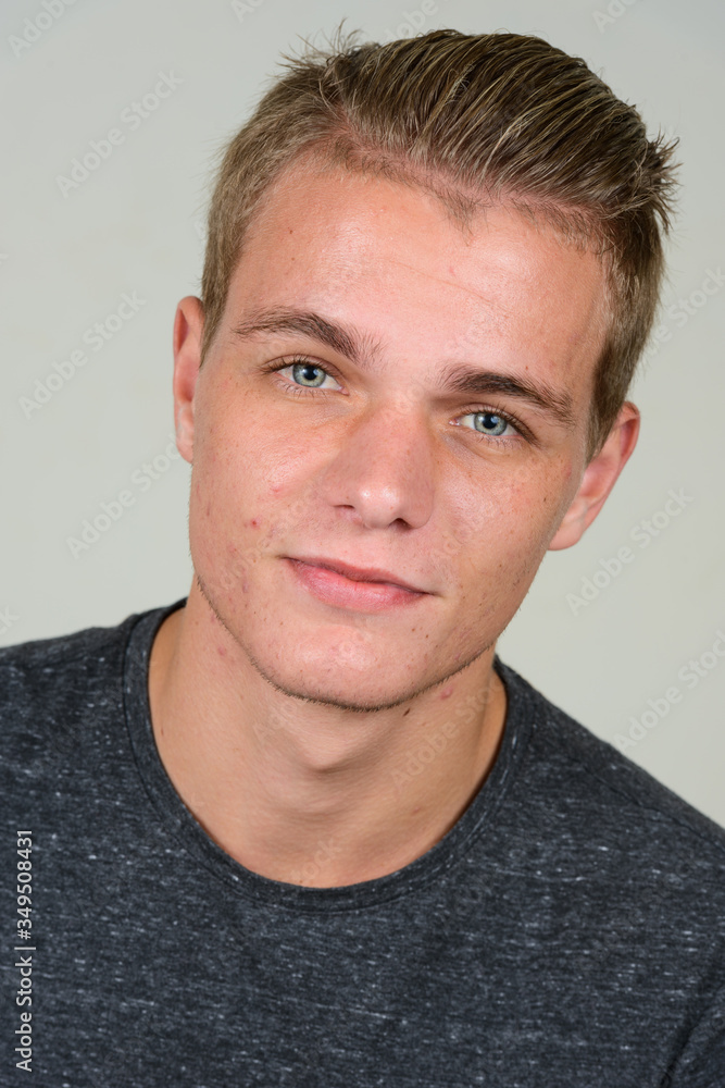 Face of young handsome man with blond hair Face of young handsome man with blond hair