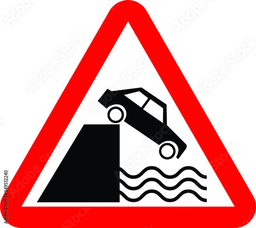 Sudden slope ahead road safety sign