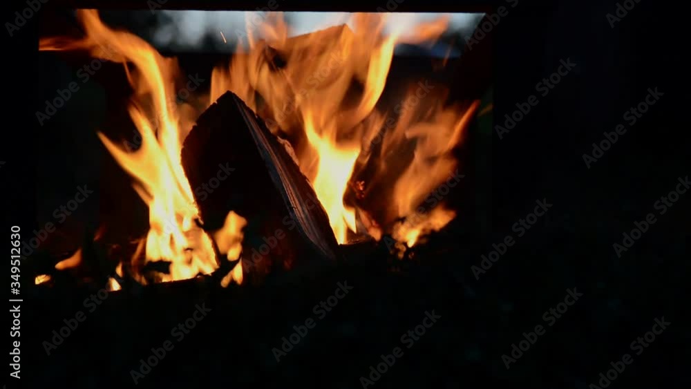 flame fire of bonfire with birch firewood on night, side view close-up full HD stock video footage in real-time flame fire of bonfire with birch firewood on night, side view close-up full HD stock video footage in real-time