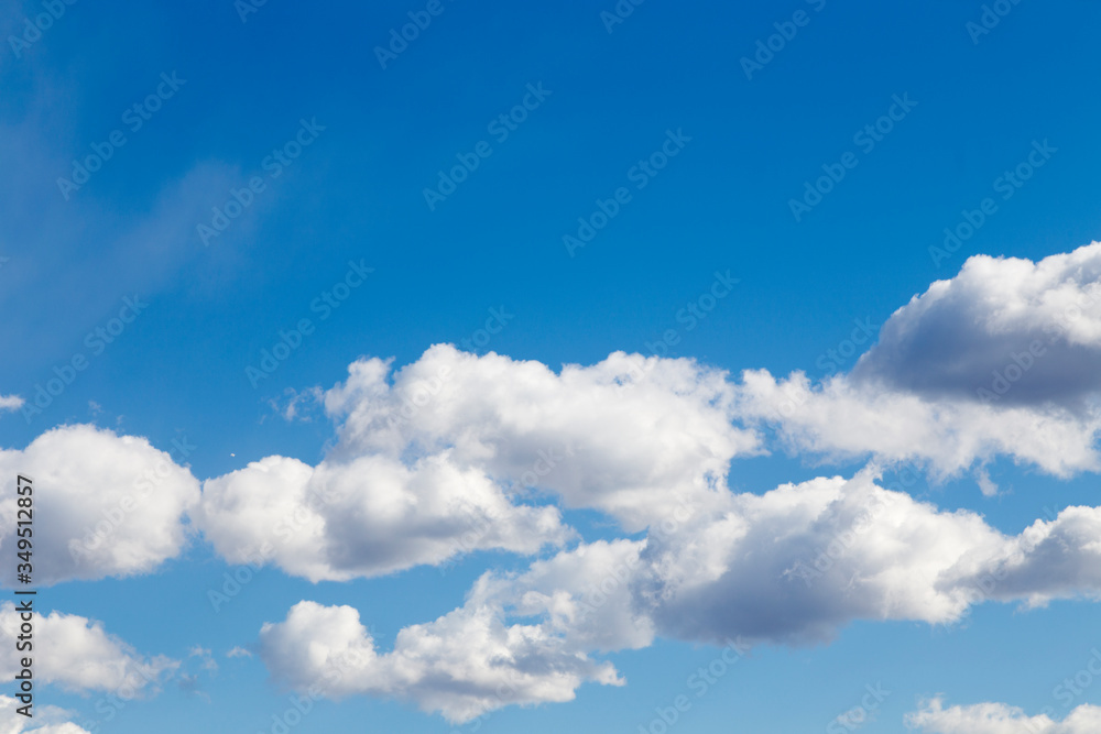 Blue sky as background with fluffy clouds. Blue sky as background with fluffy clouds.