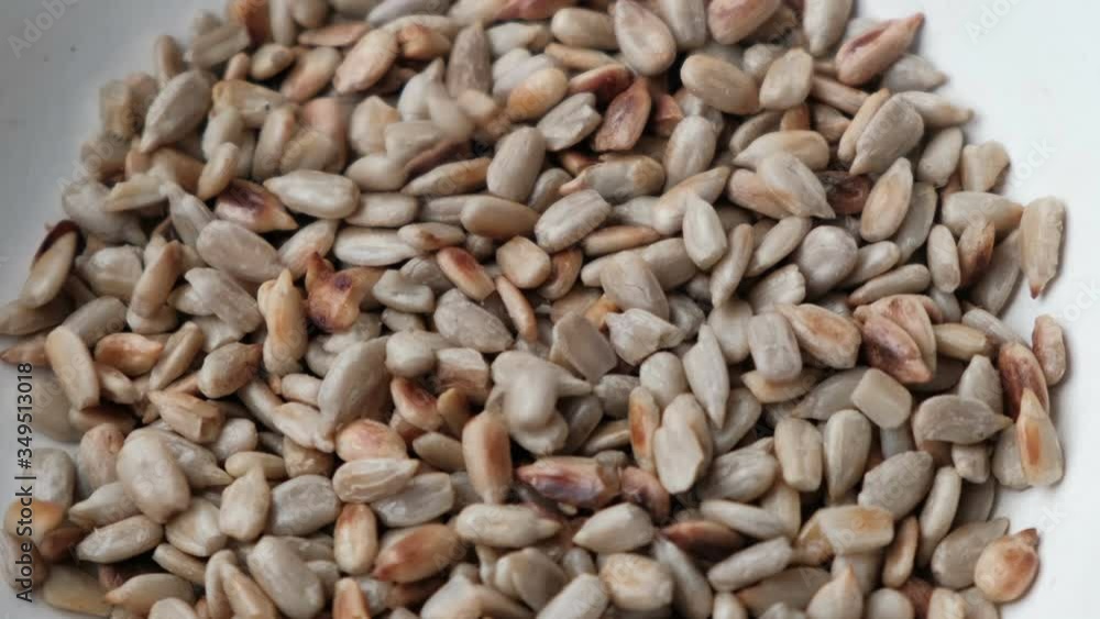 Close-up of peeled roasted sunflower seeds, close up Close-up of peeled roasted sunflower seeds, close up