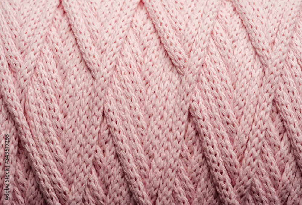 The texture of the rope pink in a skein. Abstract background. The texture of the rope pink in a skein. Abstract background.