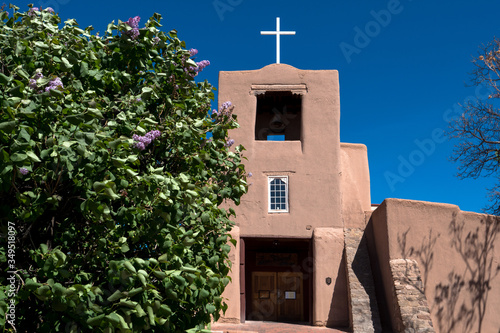 Historic San Miguel Church, the oldest in the USA, on the Old Santa Fe Trail in Santa Fe, New Mexico photo