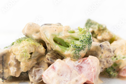 Stewed meat with vegetables in sour cream sauce. I