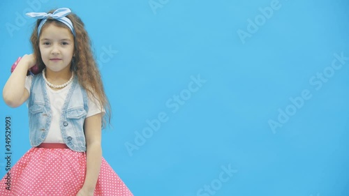 4k video where litttle girl taking pink high heels away.