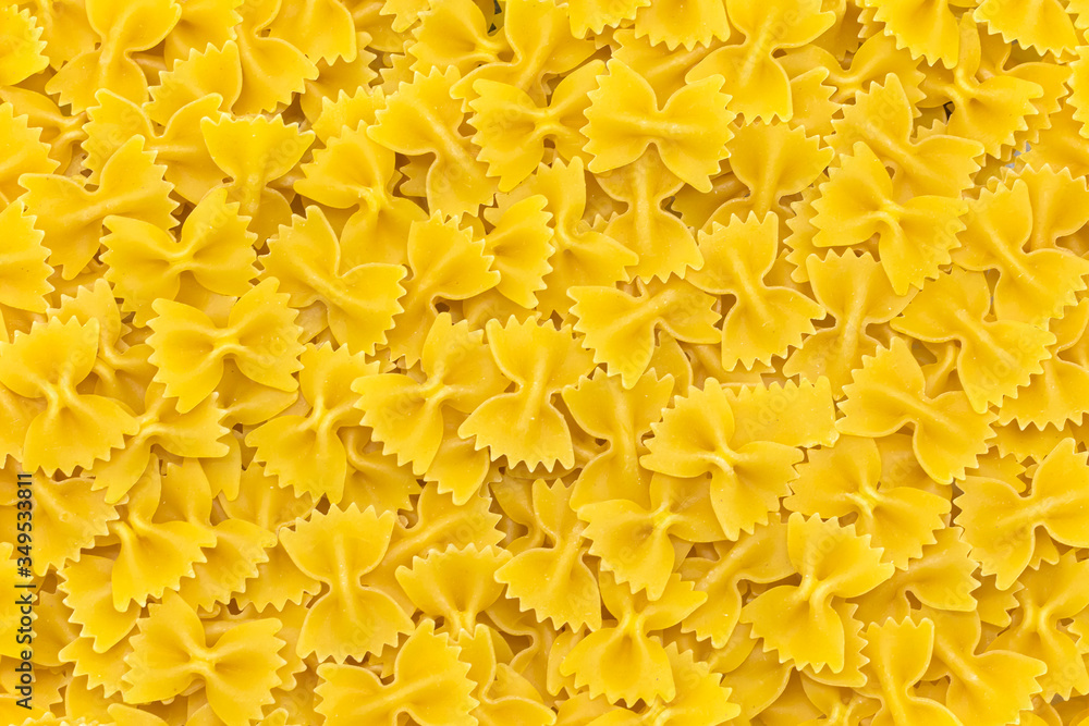 Uncooked farfalle pasta as background, closeup
Uncooked farfalle pasta as background, closeup