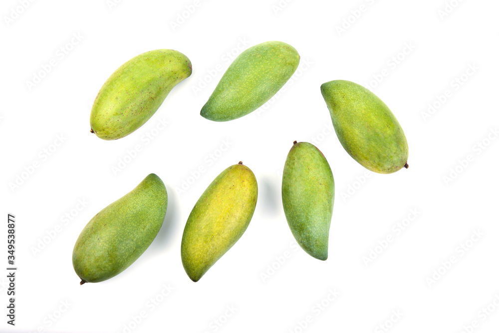 Fresh green mango on white background. Top view of keaw sawaei mango. High angle view of mangoes. Tropical fruit. Fresh green mango on white background. Top view of keaw sawaei mango. High angle view of mangoes. Tropical fruit.