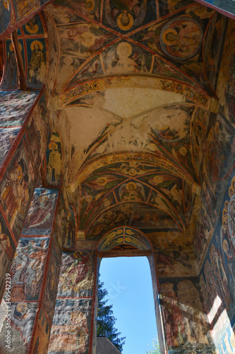Obraz na płótnie Moldovita monastery in the Vatra Modovitei region south of Bucovina, Romania, Europe. Main entrance, Moldovan architectural style and paintings of Byzantine influence with bucovin colors w salonie