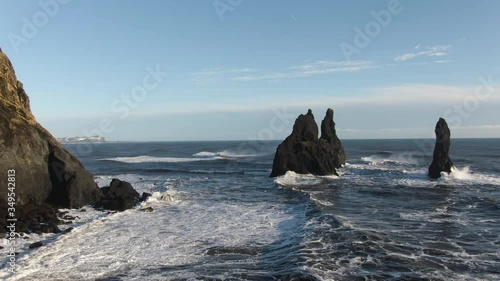 Coastline with rock formation and high waves