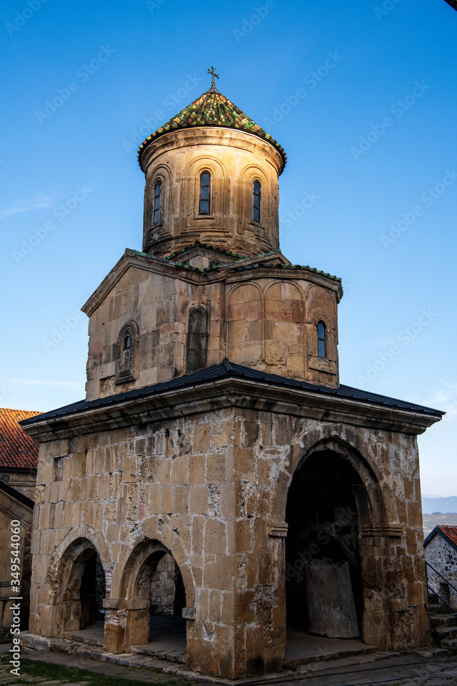 The monastery of Ghelati illuminated by the morning sun. The monastery of Ghelati illuminated by the morning sun.