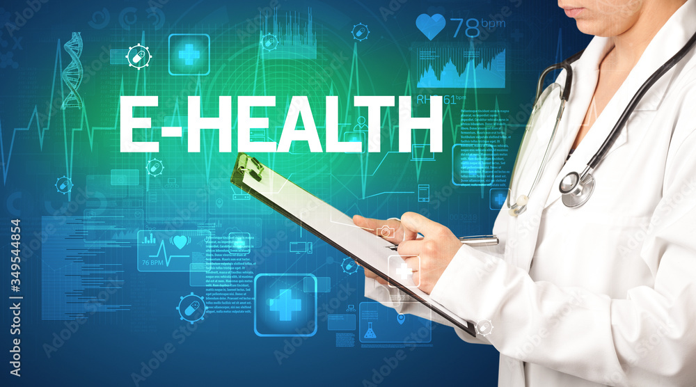 young doctor writing down notes with E-HEALTH inscription, healthcare concept young doctor writing down notes with E-HEALTH inscription, healthcare concept