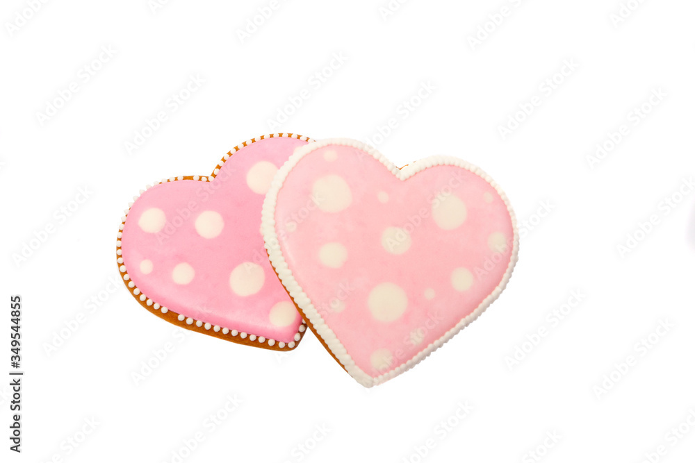 background from pink cookies heart shaped with different patterns, isolated background from pink cookies heart shaped with different patterns, isolated