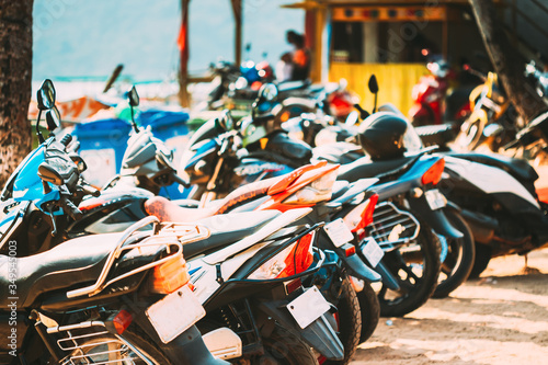 Wallpaper Mural Motorbikes, motorcycles scooters parked in row in city street. Close up of details. Bikes Torontodigital.ca